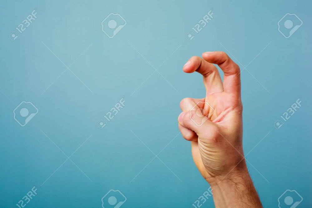25911053 hand making bunny ears with two fingers against blue background