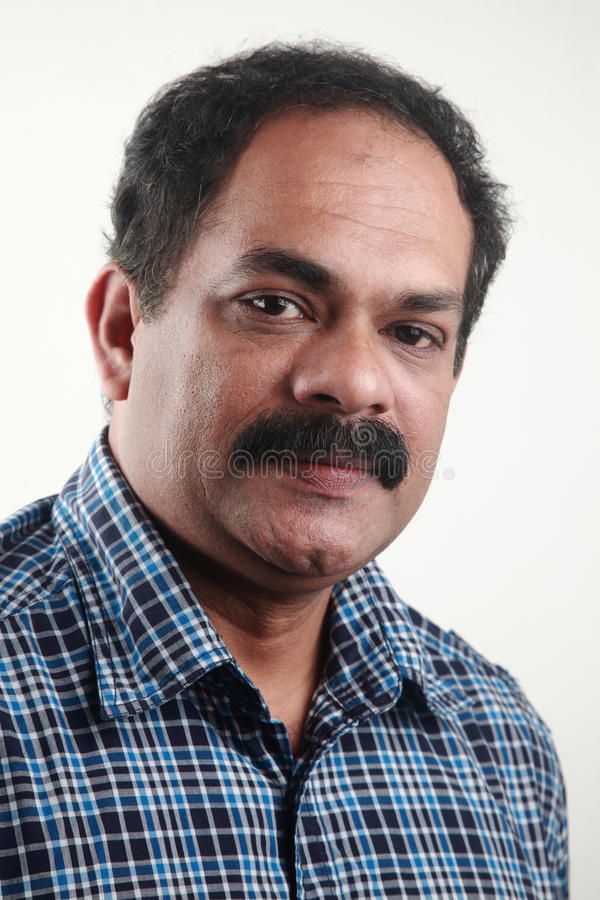 Portrait middle aged indian male confident expression 54137034