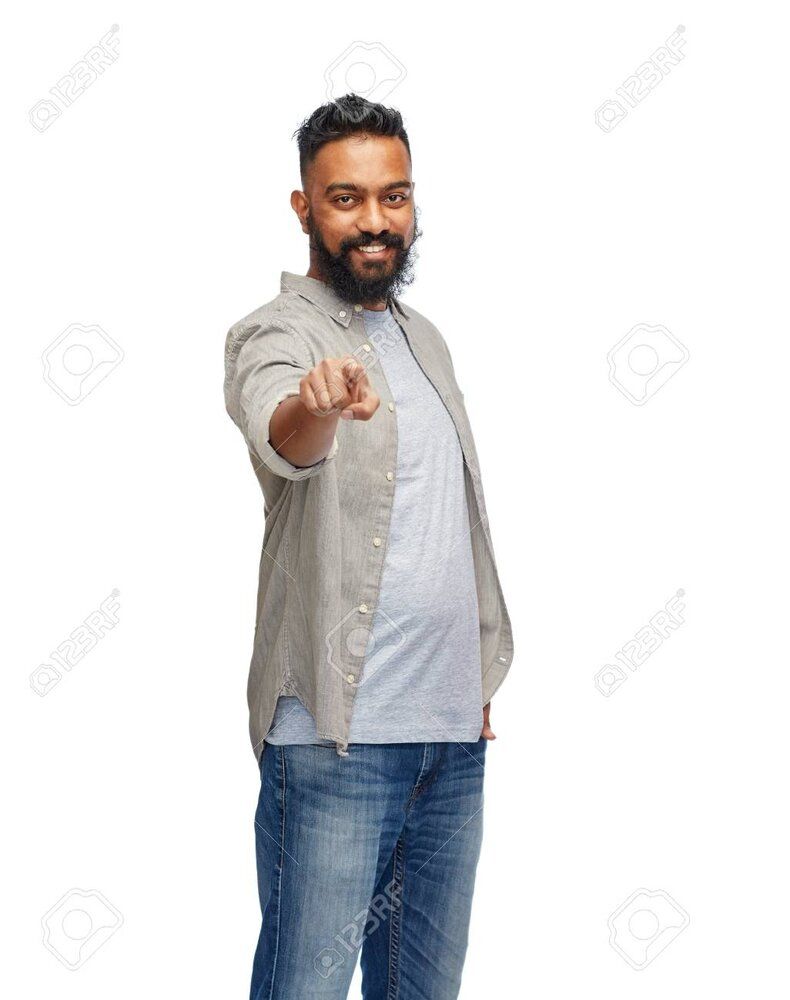 68529339 happy smiling indian man pointing finger to you