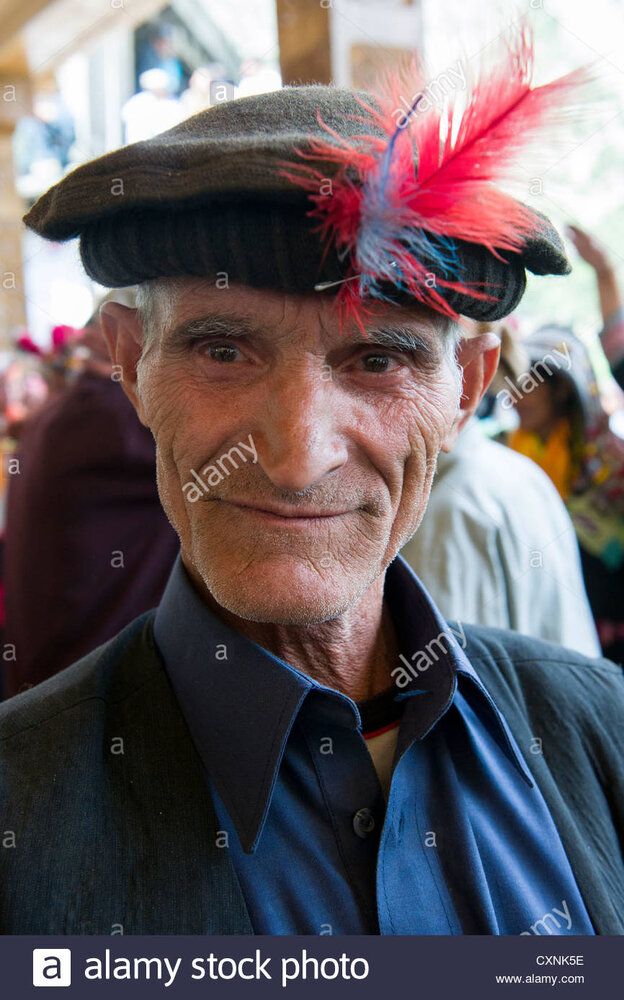 Kalash man with characteristic feather in his cap at the joshi spring CXNK5E