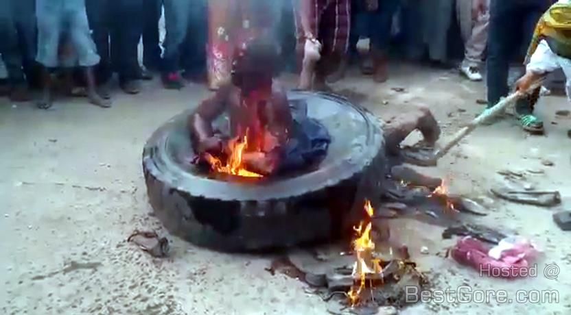 Lynching africa man burn death necklacing