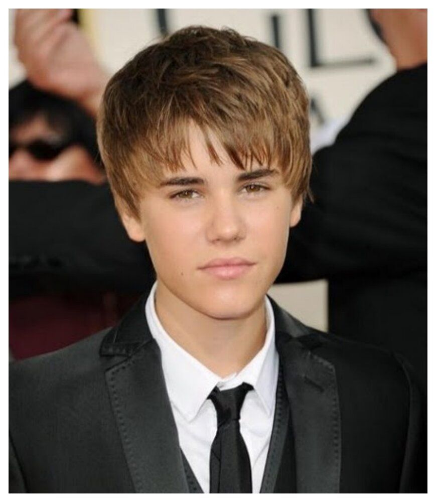 Justin Bieber Hairstyle with Black pant Coat
