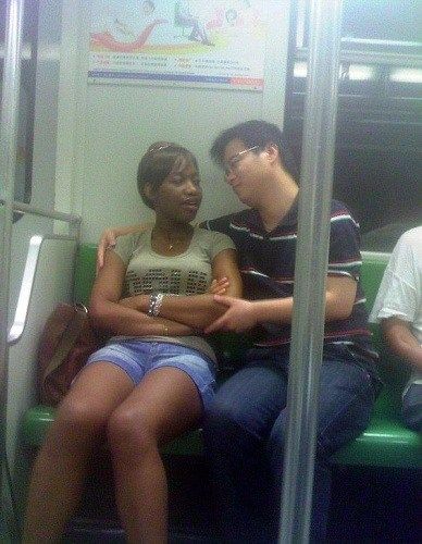 Chinese man and African wife on the subway in South Africa
