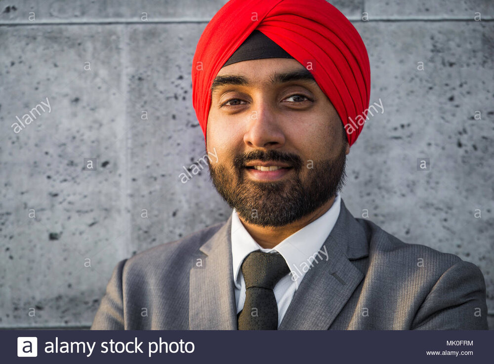 Punjabi businessman portrait outdoors hindi man wearing formal elegant suit MK0FRM
