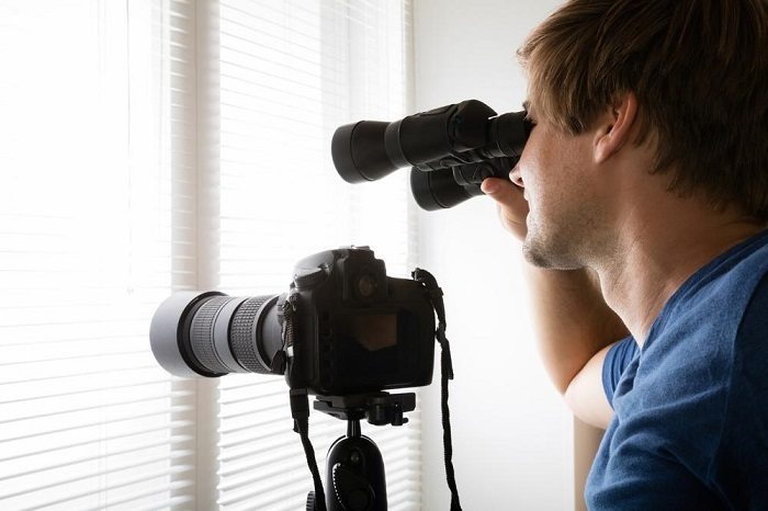 Is spying on someone illegal