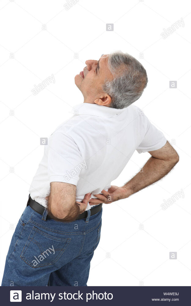 Indian old man suffering from lower back pain W4WE9J