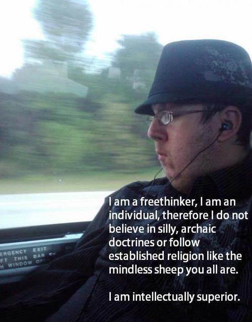 In moving train with caption explaining hes a free thinking atheist who is intellectually supe