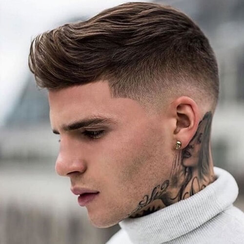 Short pompadour swept to the front
