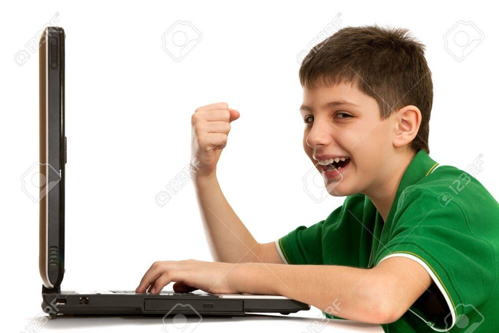 6436942 an emotional kid is playing a computer game isolated on the white background