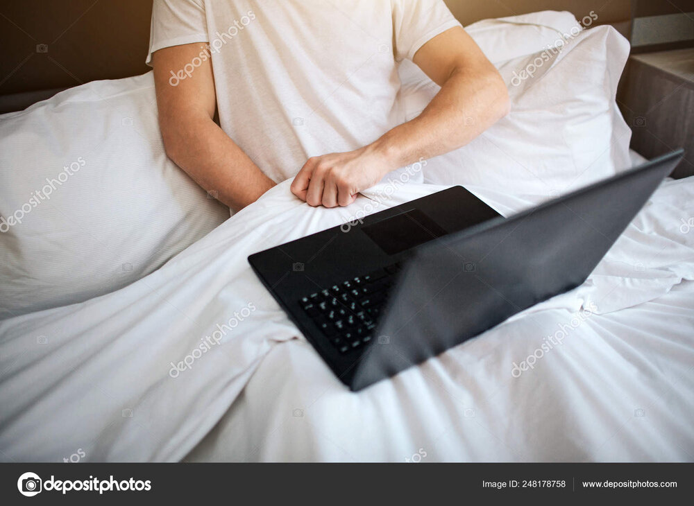 Depositphotos 248178758 stock photo young man sit in bed