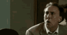 Nicoholas cage laughing gif