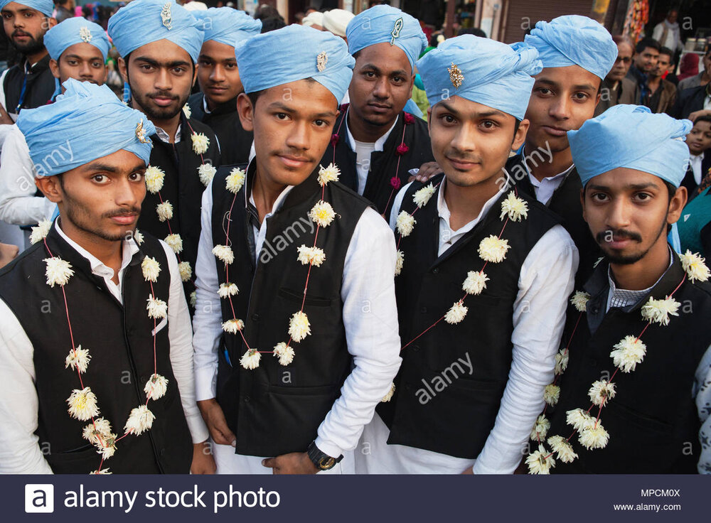 India uttar pradesh faizabad a group of muslim in traditional costume to celebrate the festiva