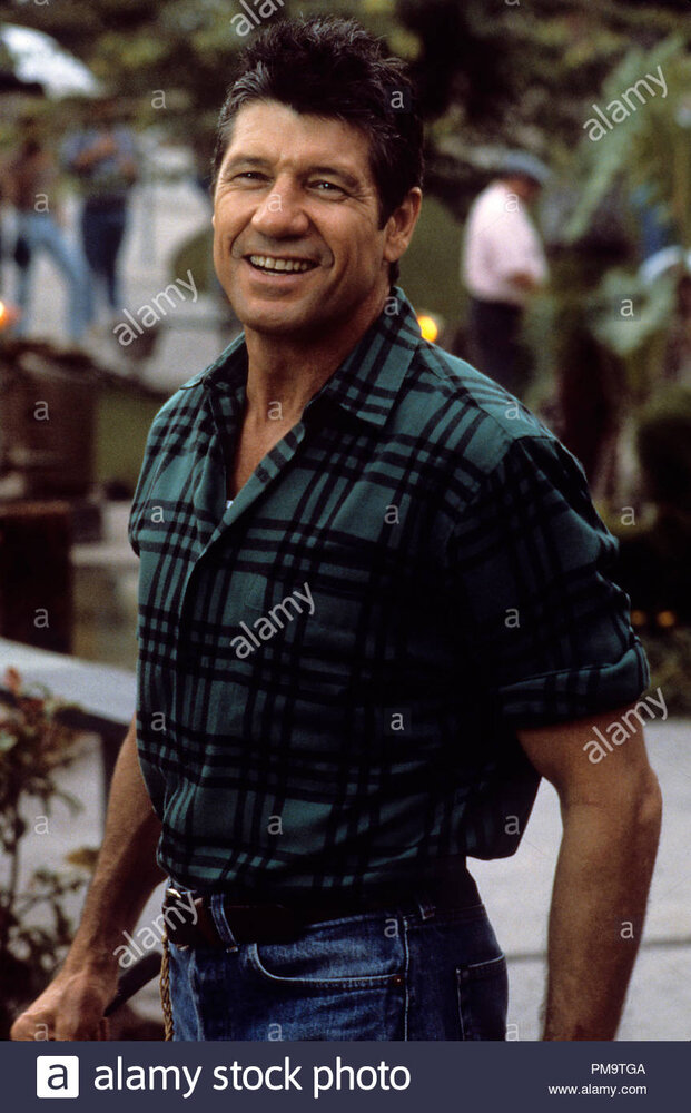 Studio publicity still from big business fred ward 1988 touchstone pictures photo credit laure
