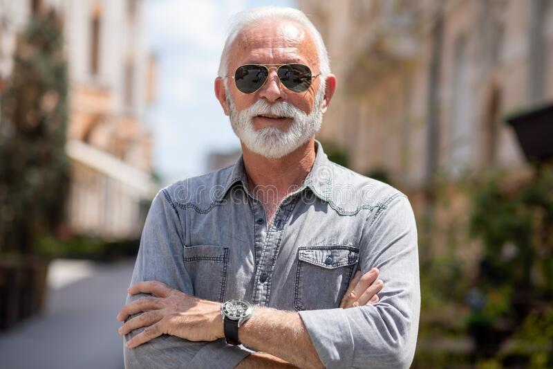Old rich man sun glasse beard street portrait happy posing smiling 186133275