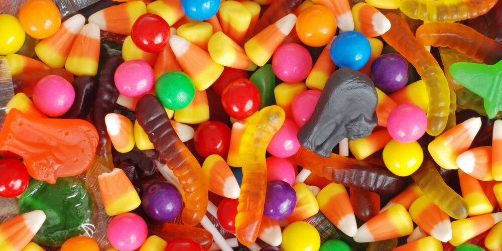 Mixed halloween candy background royalty free image 176869502 1567700779