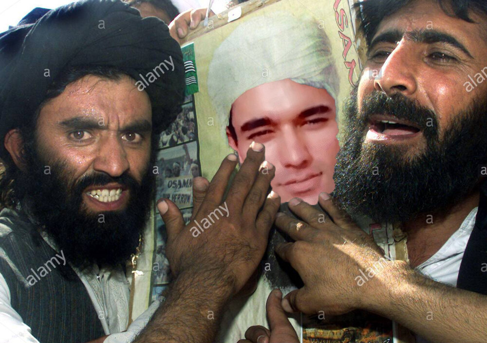 Pakistani protesters shout slogans against the us as they hold a poster of osama bin laden dur