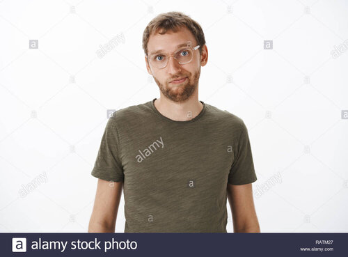 Portrait of cute and helpful good looking male friend in glasses and green casual t shirt smil