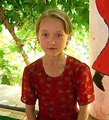 220px Uyghur girl in Turpan Xinjiang China   20050712