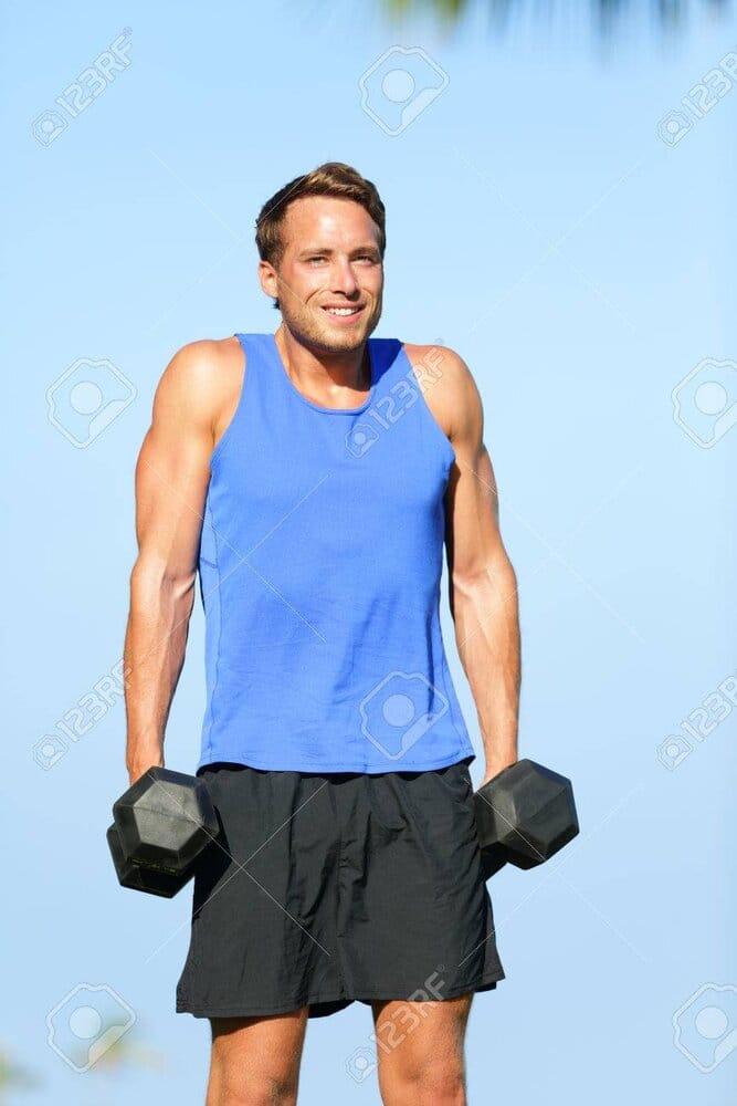 26345680 shoulder shrug weight training fitness man outdoor working out shoulders lifting dumb