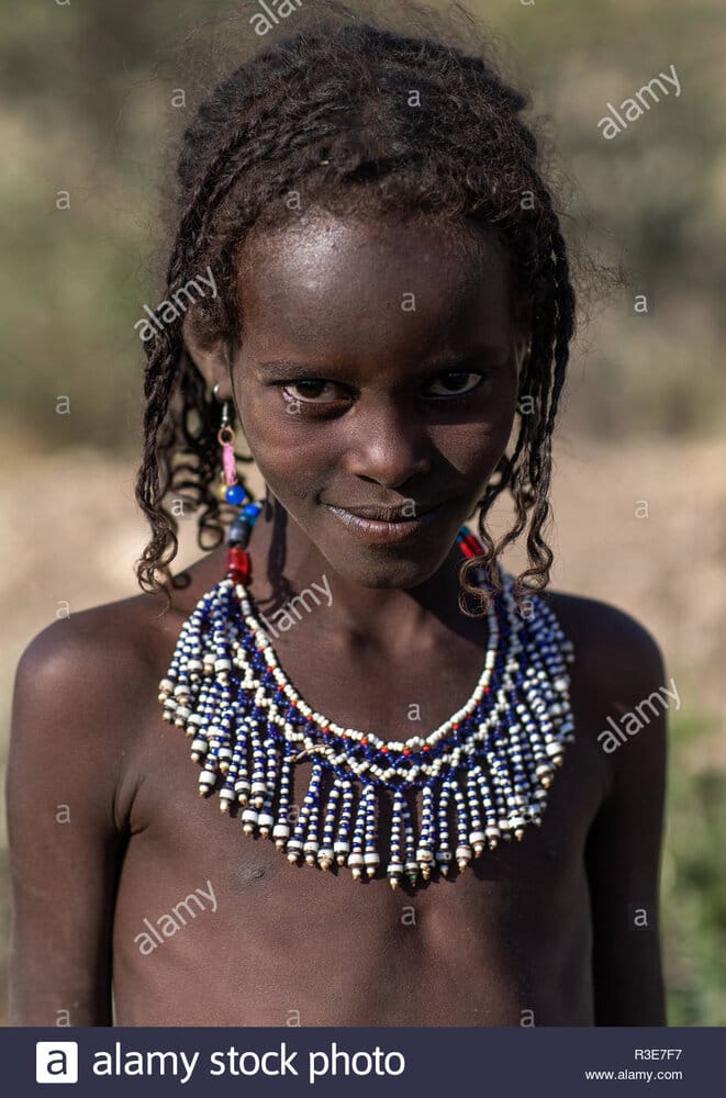 Portrait of an afar tribe girl with a beaded necklace afar region mile ethiopia R3E7F7