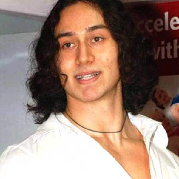 Younger tiger shroff with his big hair locks poses for a pic 201603 678189