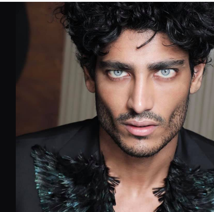 Indian dude with light emerald