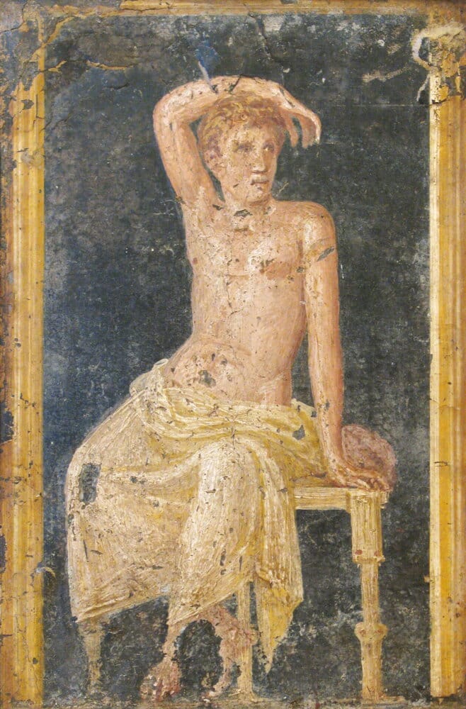 Giovane seduto