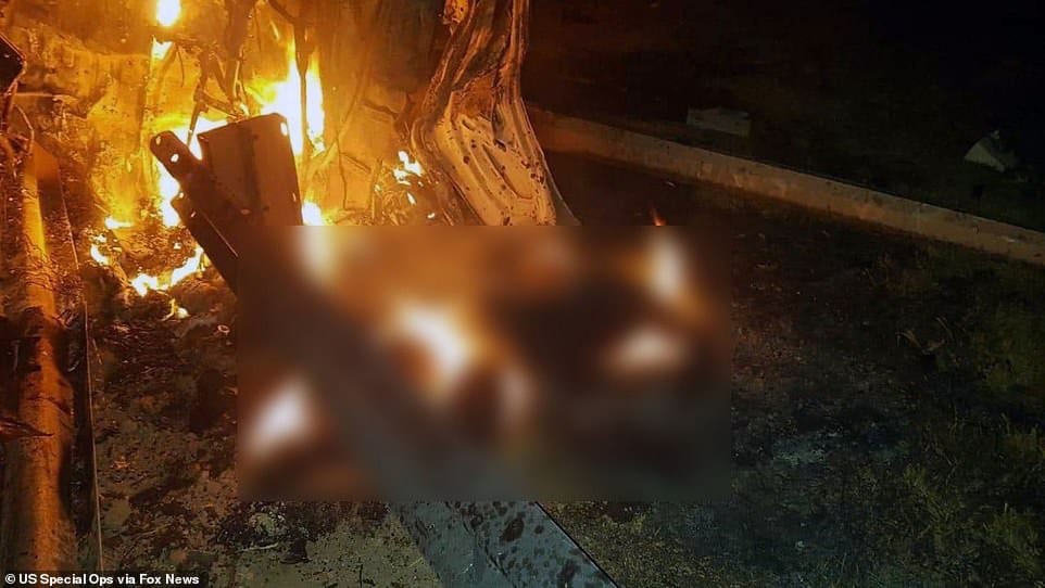 23269912 7876089 In another photo Soleimani s body has been blurred out as it lie a 2 15787504