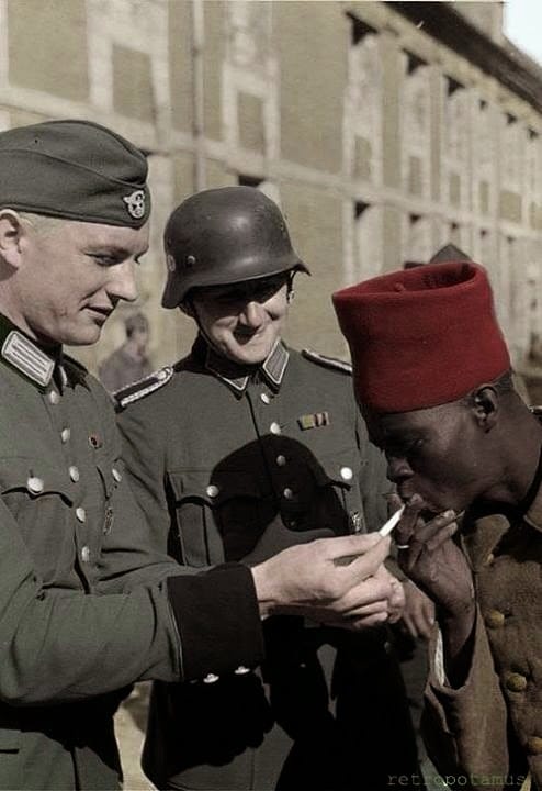 Nazis lighting up a black man