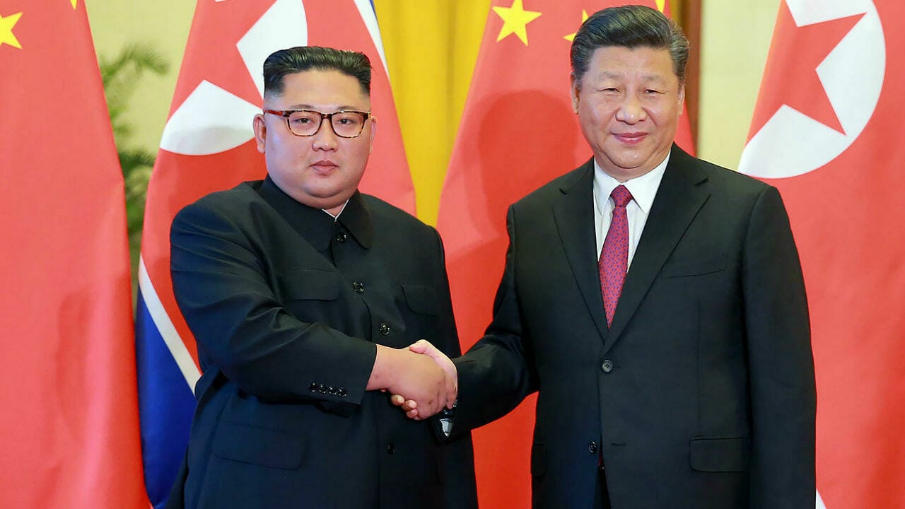 Xi