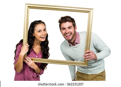 Portrait happy couple holding picture 260nw 362231207