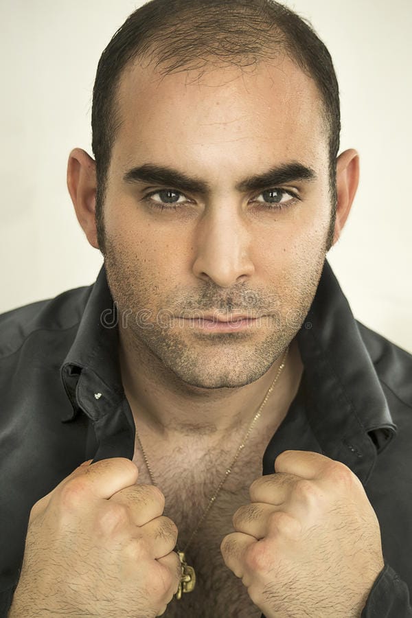 Handsome man posing mediterranean black shirt white background 41004246
