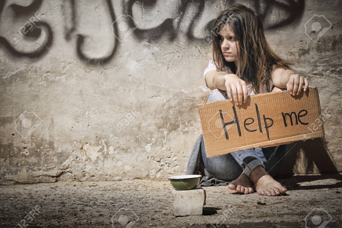 101871563 poor woman begging for help on the street