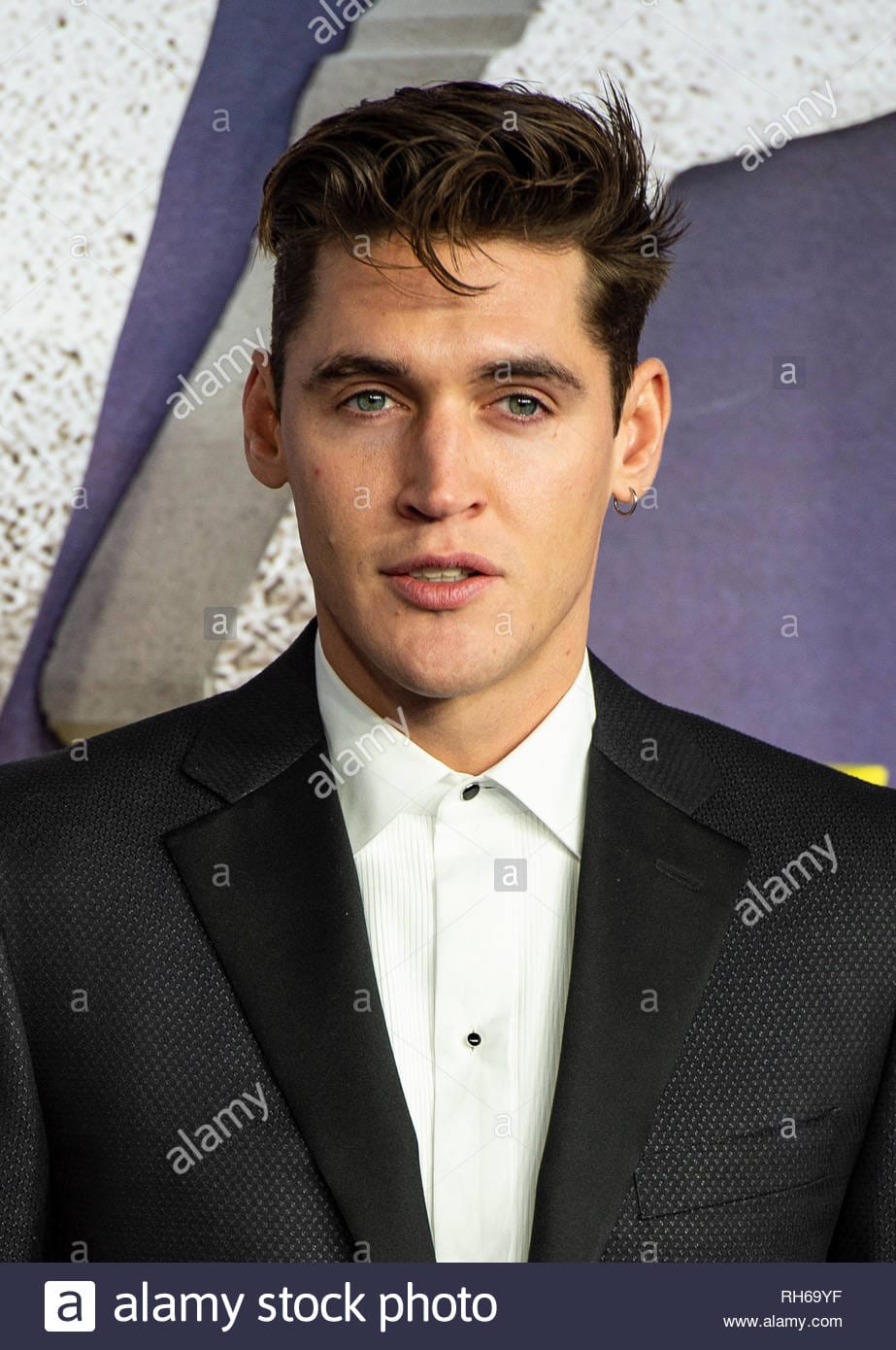 Isaac carew attends the world premiere of alita battle angel at odeon leicester square RH69YF 