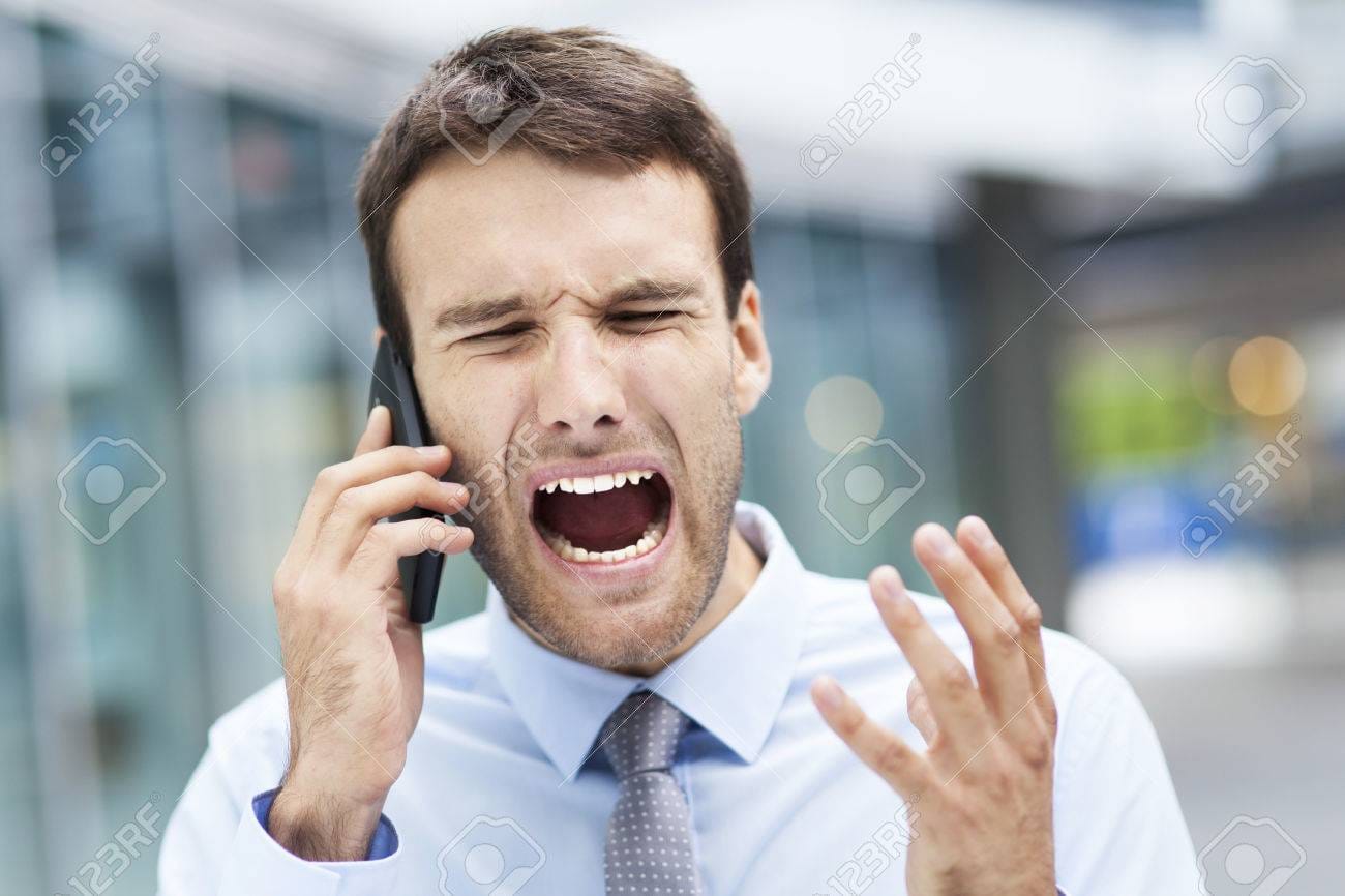 22699771 man screaming at phone