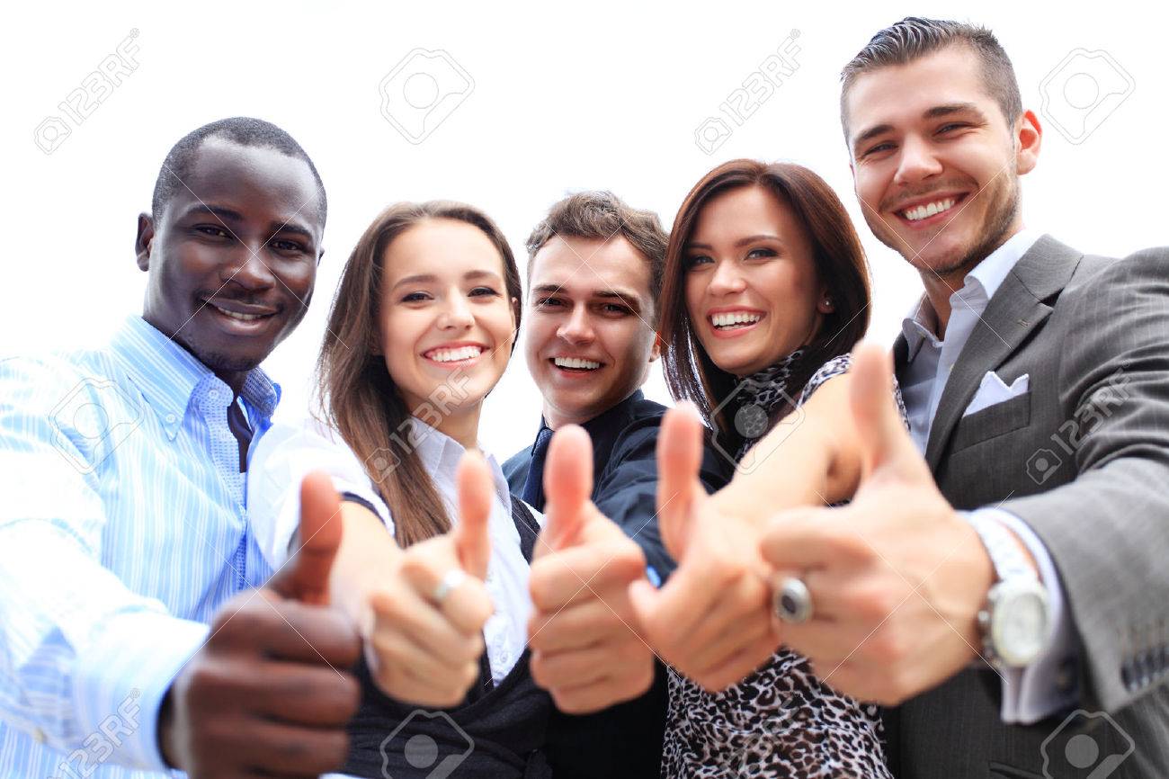 27115376 successful young business people showing thumbs up sign