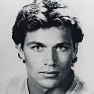 Hexum in a black and white what a mogger