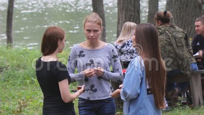 Chapaevsk samara region russia august youth teens picnic party near lake three girl friends ta