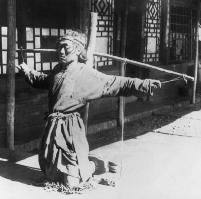 TortureKneelingOnChains