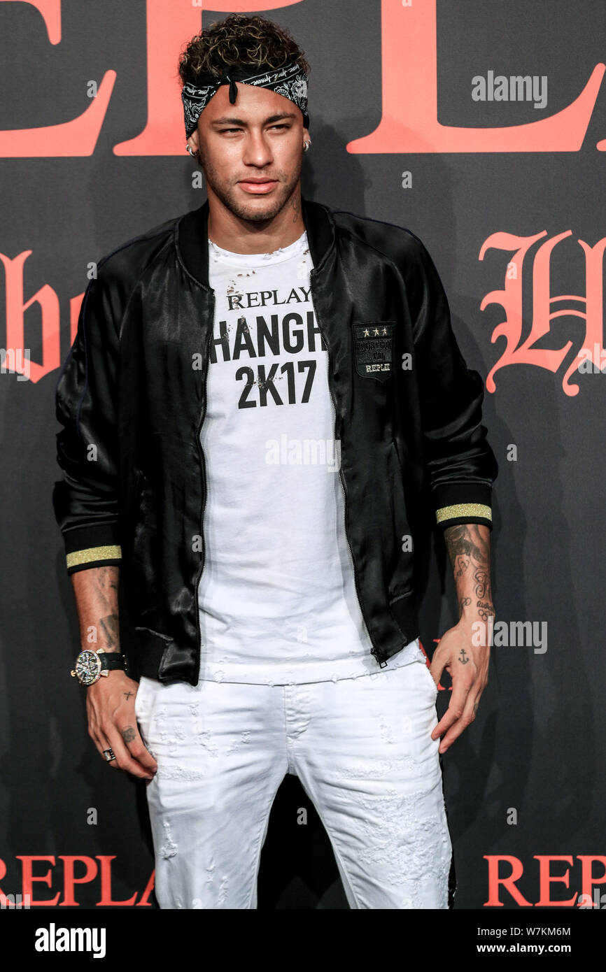 Brazilian football star neymar or neymar jr poses as he arrives at the fashion show of the rep