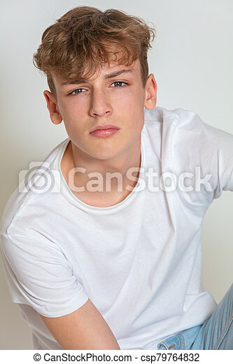 Thoughtful moody teen male teenager boy stock photos csp79764832