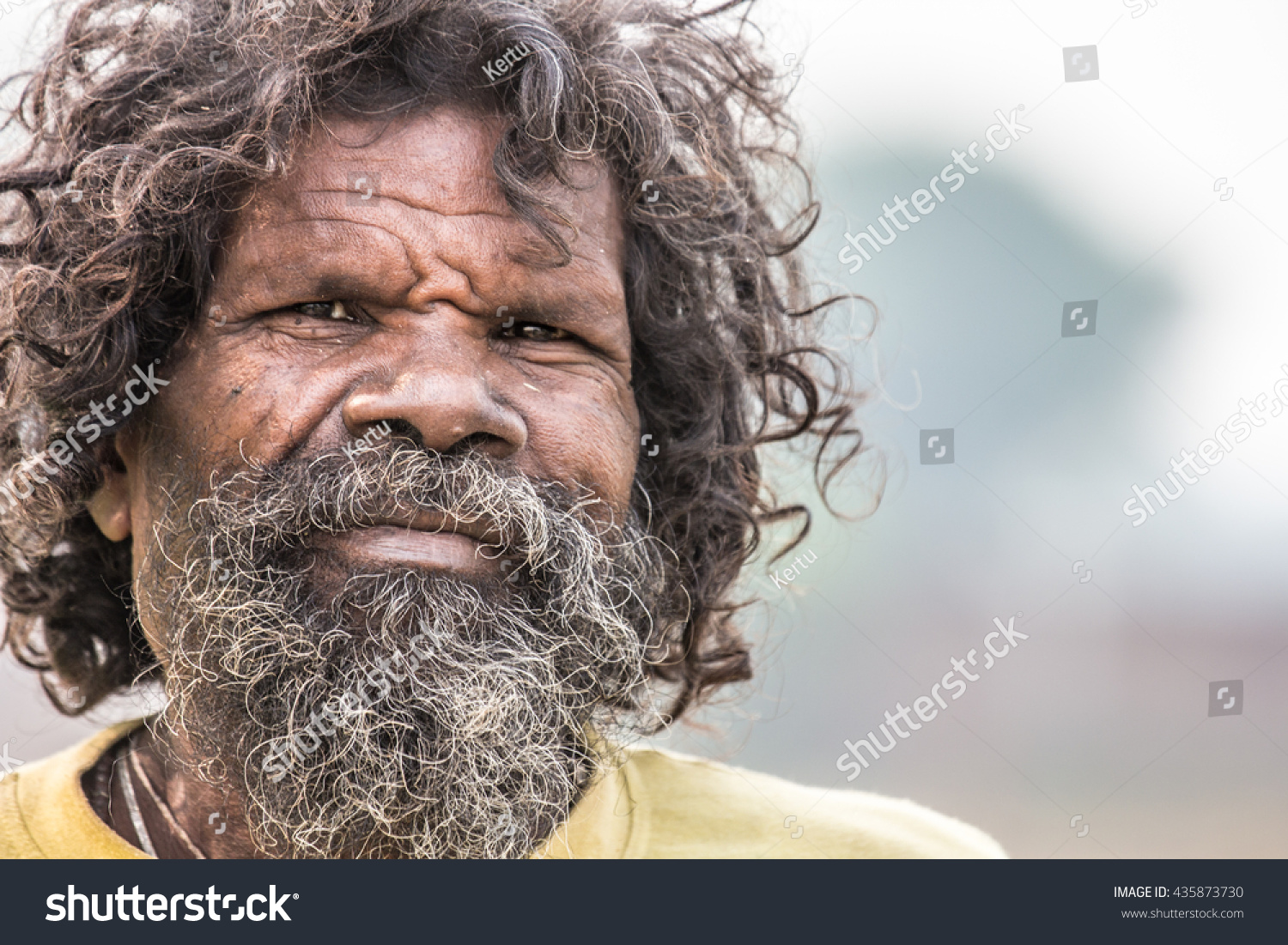 Stock photo an aboriginal man is a minority in an indian city of varanasi at the banks of gang