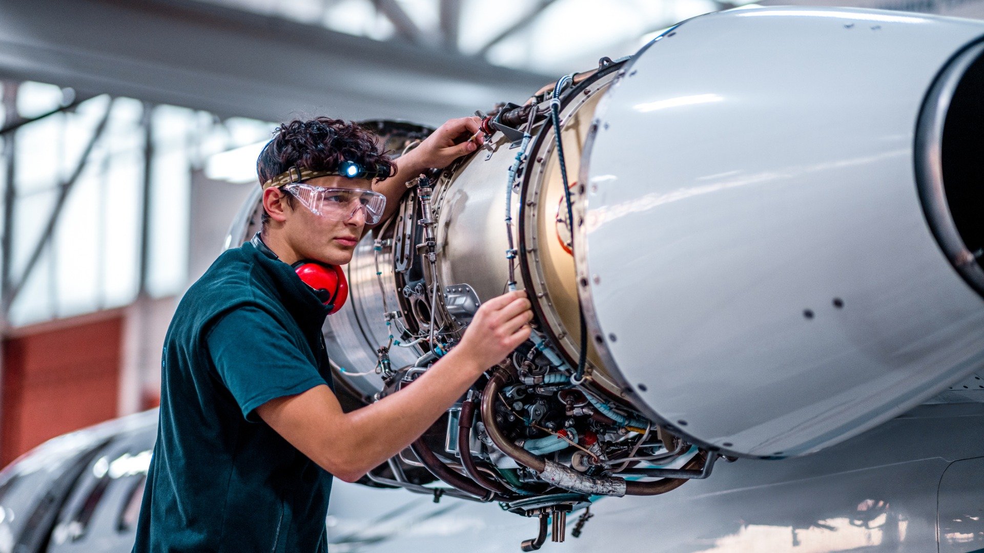 Maintenance mechanic inspecting the jet engine picture id1286754258