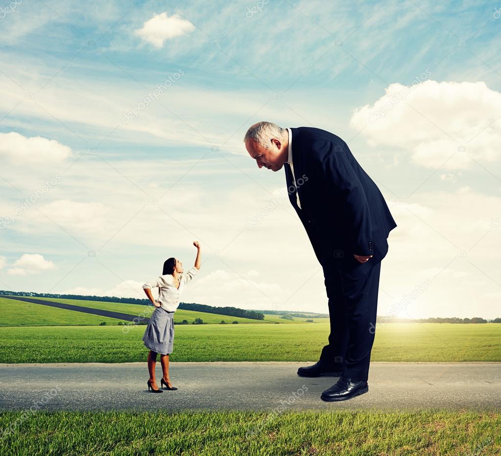 Depositphotos 43167341 stock photo big man looking at small