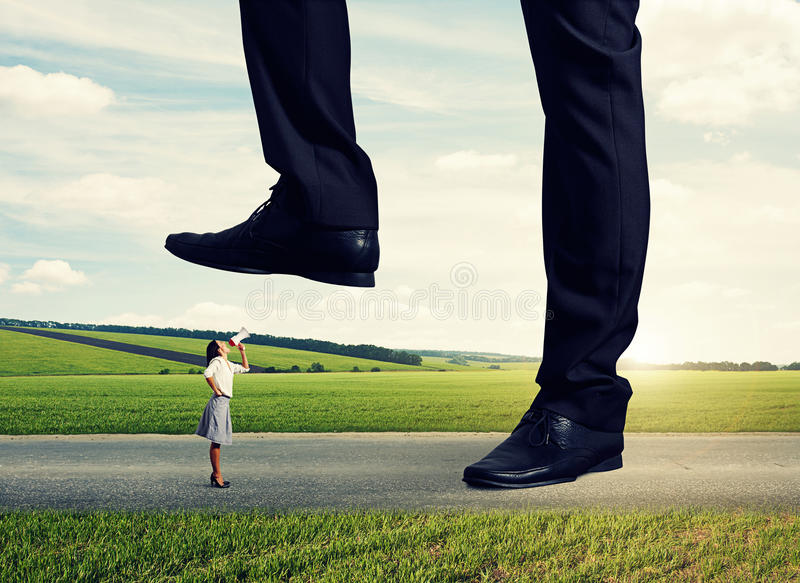 Woman looking up screaming big man angry road 39989533