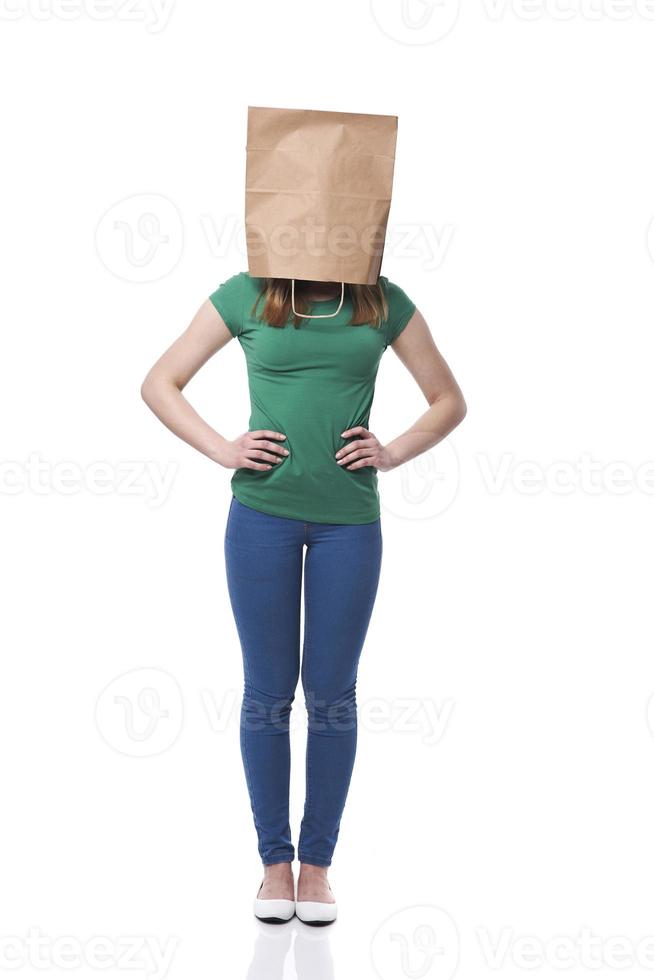 Female ecologist with paper bag on head photo