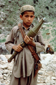 Child soldier with arms afghan
