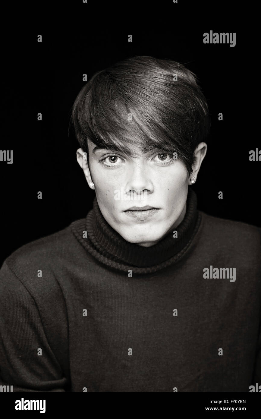 Young male with thin face and high cheek bones head and shoulders FY0YBN 1