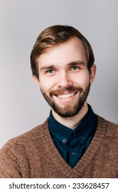 Smiling young man beard brown 260nw 233628457