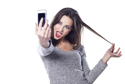 Woman taking selfie herself Woman taking selfie herself